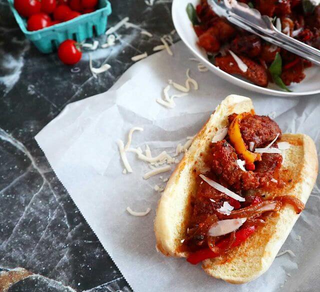 D’Italiano Original Crustini Sausage Bun filled with grilled peppers, tomato sauce and sausages 