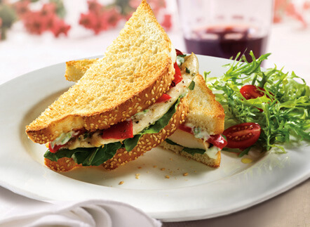 D’Italiano Tusacan Chicken and Roasted Red Pepper Sandwich made with D’Italiano sesame bread